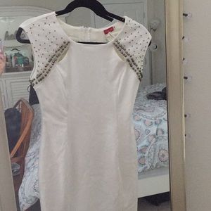 White dress with gold studs